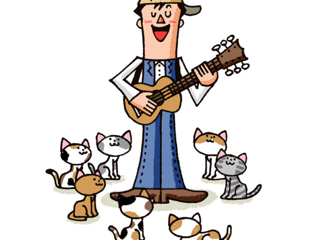 ギターを持って歌う人と猫